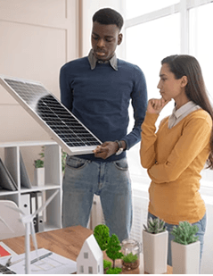 Solar consultant showing a customer a solar panel