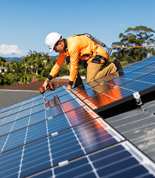 Solar installer working on a panel array