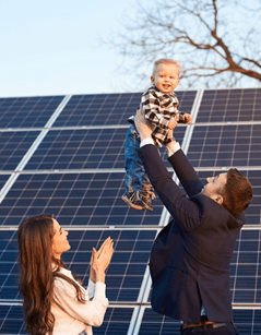 Couple outside their solar-powered home
